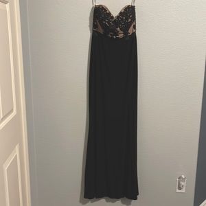 Black Jump Apparel by WendyeChcilin dress with beading on top. Size is 11/12